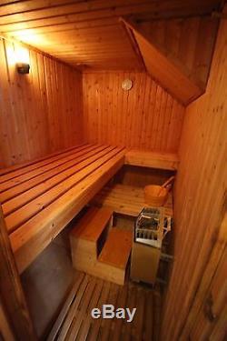 Complete indoor sauna with accessories