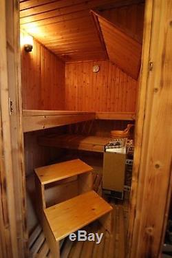 Complete indoor sauna with accessories
