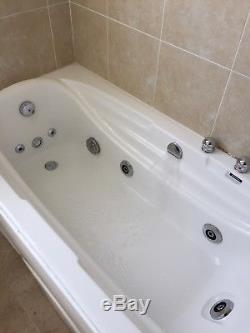 Jacuzzi bath with shower used
