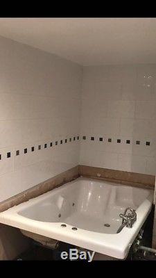 Jacuzzi spa Bath and mixer tap including shower head