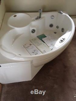 Jacuzzi spa corner Bath with taps and shower