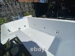 L shaped jacuzzi bath