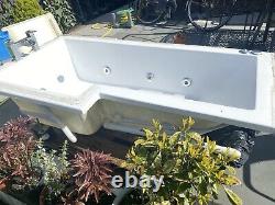 L shaped jacuzzi bath