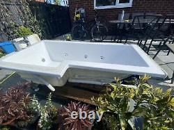 L shaped jacuzzi bath