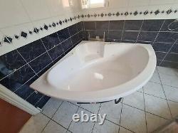 Large corner whirlpool bathtub