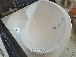 Large corner whirlpool bathtub