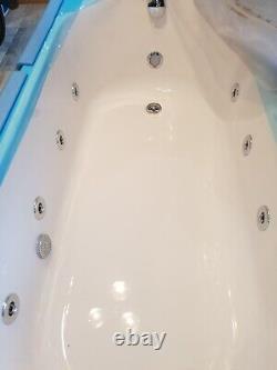Whirlpool Cooke & Lewis right handed curved white bath with 8 chrome side jets
